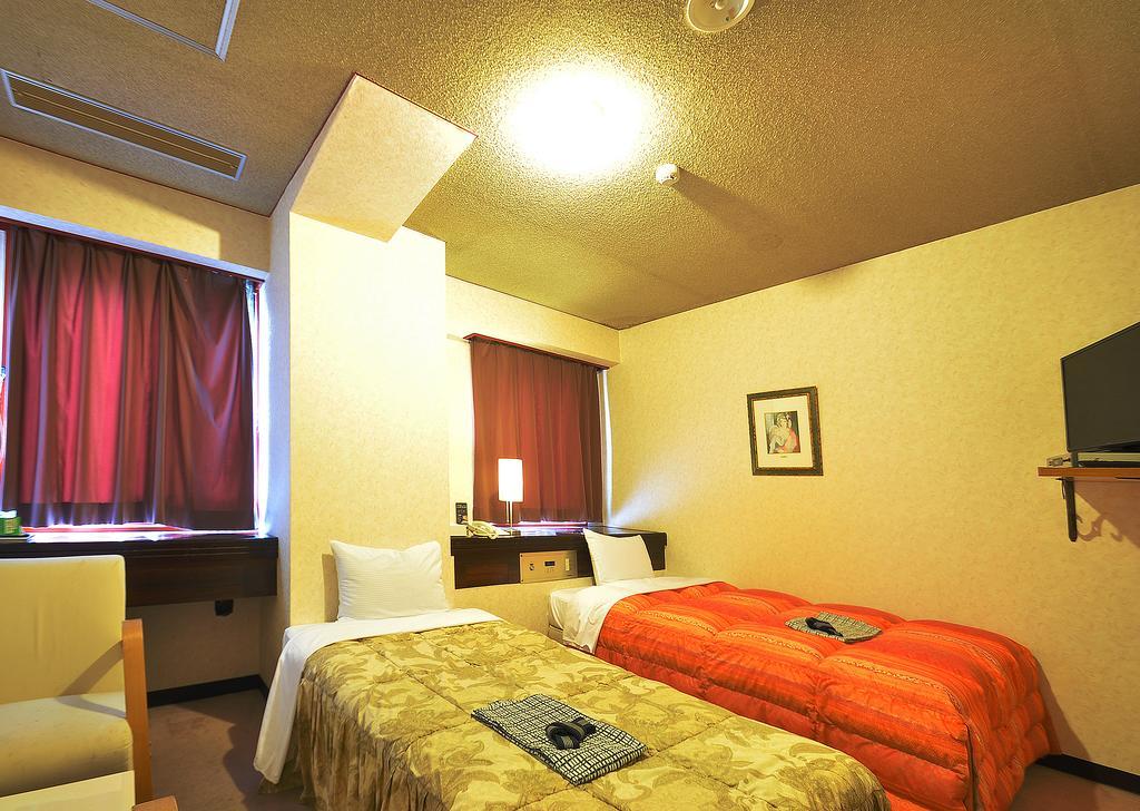 Business Hotel Atelier Кагосима Экстерьер фото