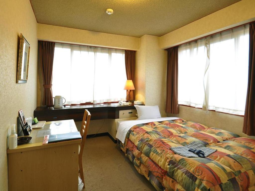 Business Hotel Atelier Кагосима Экстерьер фото