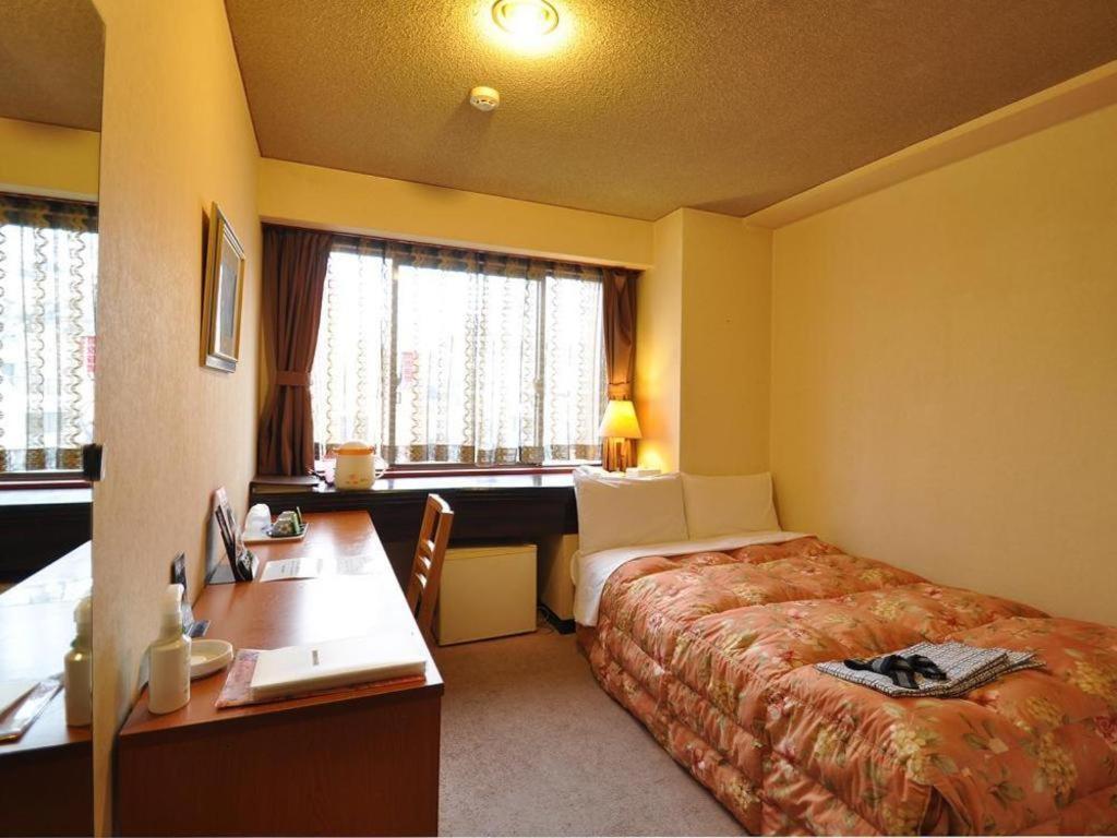 Business Hotel Atelier Кагосима Экстерьер фото