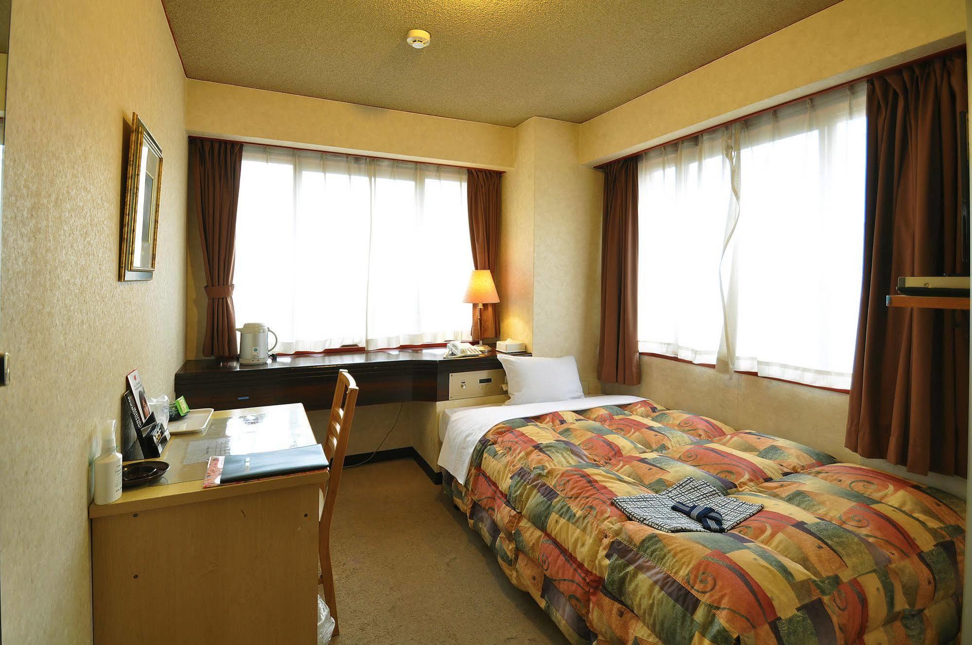 Business Hotel Atelier Кагосима Экстерьер фото