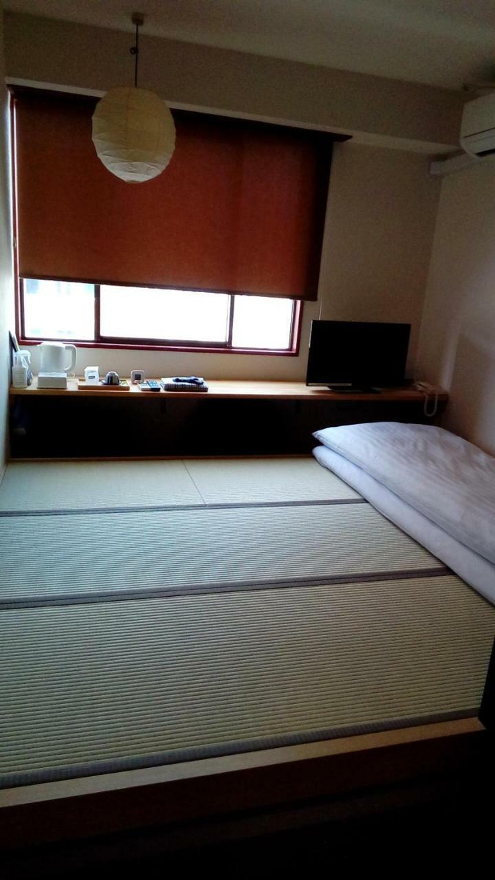 Business Hotel Atelier Кагосима Экстерьер фото